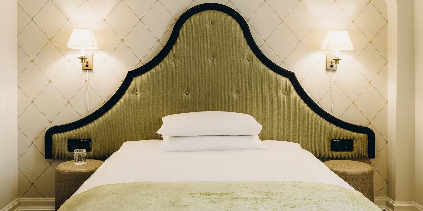 Queen size bed with nightstands on each side